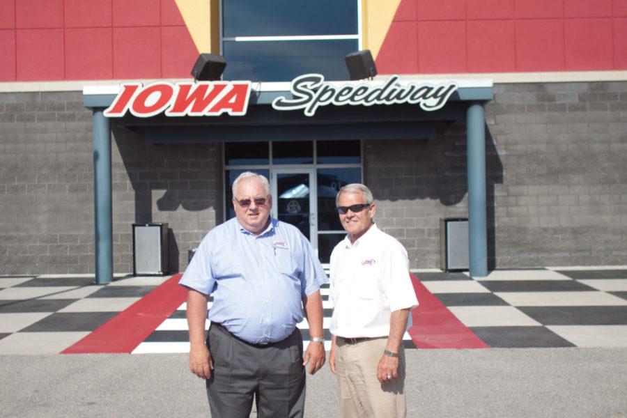 CEO of Iowa Speedway Stan Clement stands with his brother,
chairman Conrad Clement, in front of the Newton Club, a luxury
seating area at the Speedway. The two were born and raised in
Newton, Iowa.
