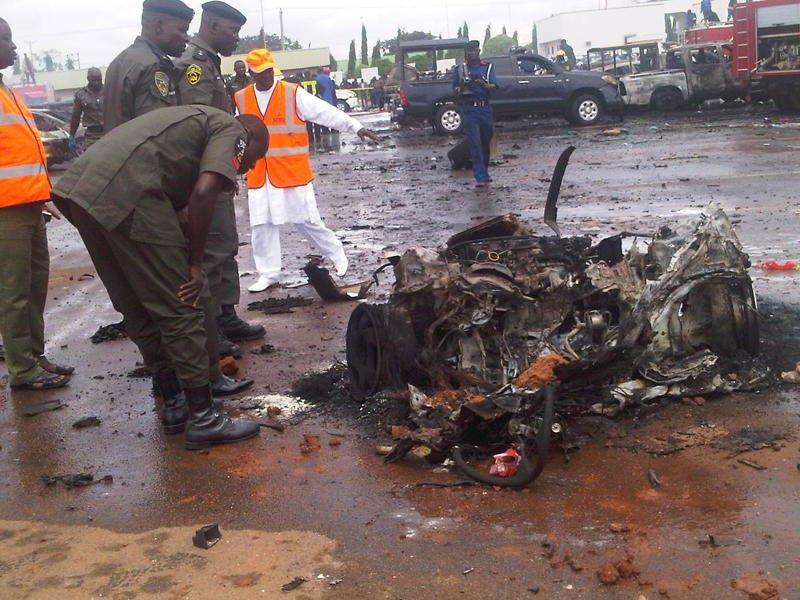 Vehicles were destroyed by the explosion at Police Headquarters
in Abuja, Nigeria on Thursday, June 16, 2011. Photography by
National Emergency Management Agency (NEMA.)

