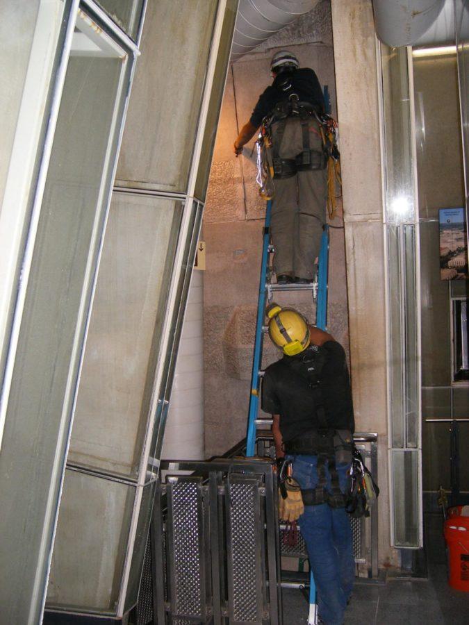 The photo shows efforts to plug cracks just before Irene hit.
Small pools of standing water were found in the Washington Monument
during inspections following Hurricane Irene, the National Park
Service told CNN Wednesday, indicating undiscovered cracks.
