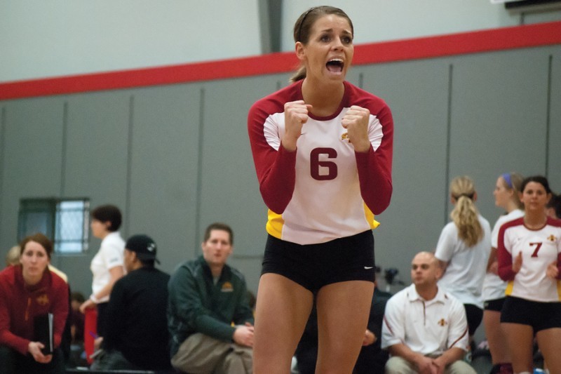 Cyclone defensive specialist Kristen Hahn celebrates after scoring during the spring tournament against Wayne State on Saturday at the West Towne Courts. The tournament marked the opening of the Cyclone volleyball spring season and hosted teams from Wayne State, University of Northern Iowa and Minnesota.