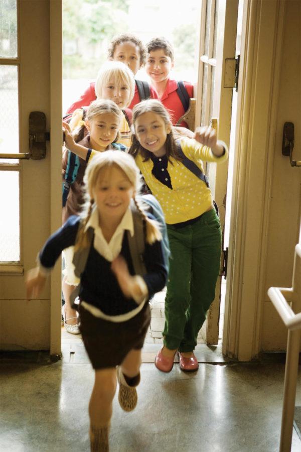 Children running through door.
