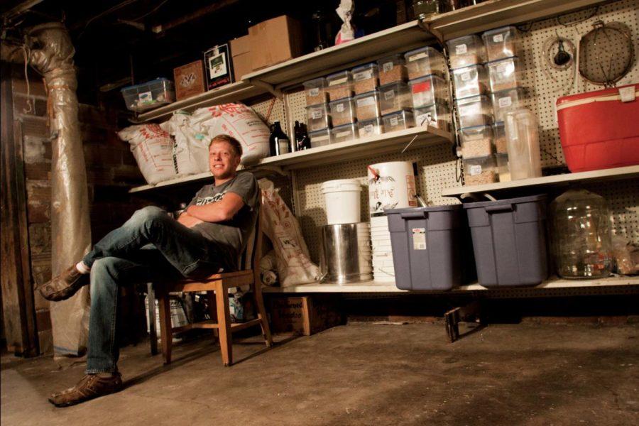 Kelly Bevins, owner of Boozetime Brewery, sits in his basement microbrewery. Blevins brew has gained its fame because of its cost — its free. Because he is unlicensed, he is able to give his beer away for free at events such as the one at DGs Tap House on Thursday.
