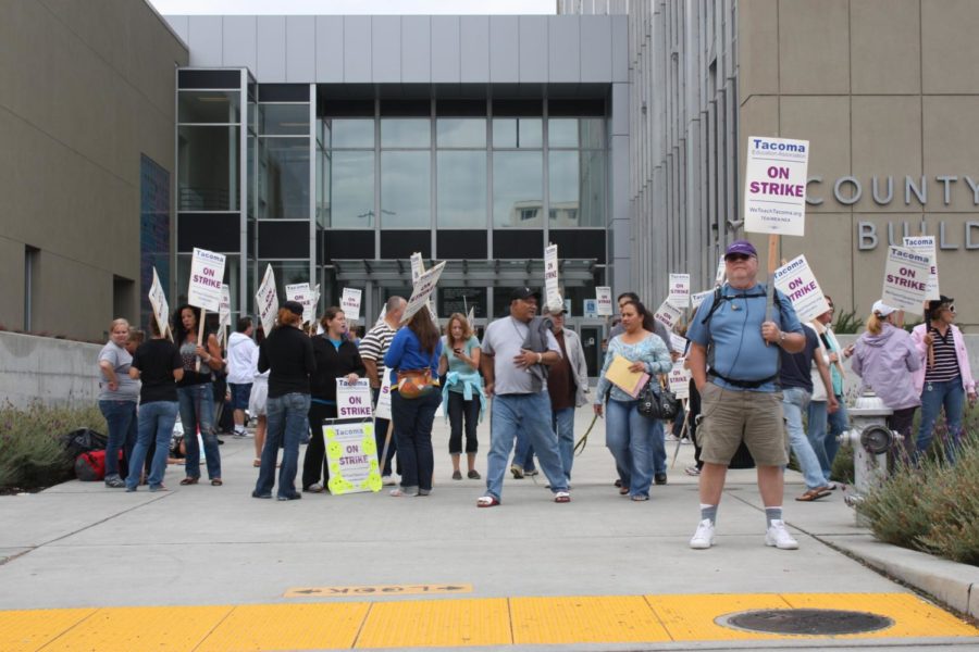 Some 28,000 students have been out of school for most of the
week after teachers in Tacomas school district went out strike.
The school district sued the teachers union to get teachers back
into the classroom, saying the strike was harming students.
