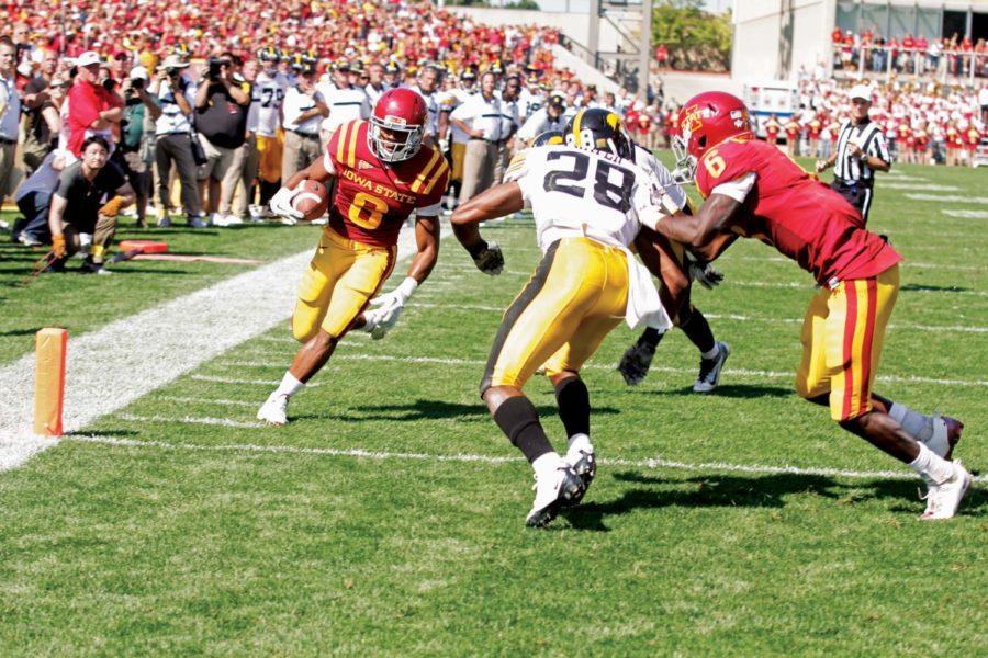 Running back James White runs the ball in for a the game-winning touchdown Saturday at Jack Trice Stadium. White had two touchdowns and 35 rushing yards to aid the Cyclones in a 44-41 victory over the Hawkeyes in triple overtime.