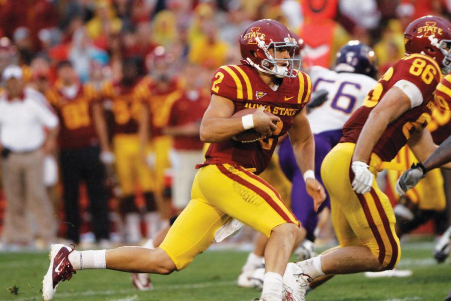 Quarterback Steele Jantz runs the ball around UNIs defense
during the Iowa State-Northern Iowa game on Saturday. Jantz rushed
for a total of 80 yards and scored one touchdown. 
