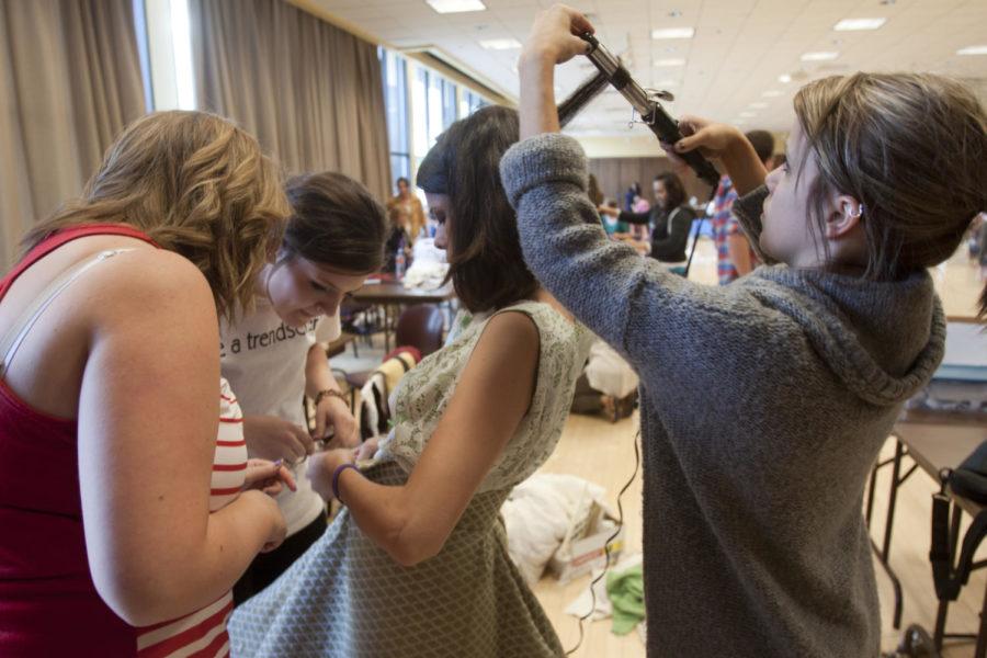 Project Runway was held on Sept. 25, 2011 in the Memorial
Union. The Project Runway group puts the finishing touches on their
dress. They were judged on whether they followed the theme.
