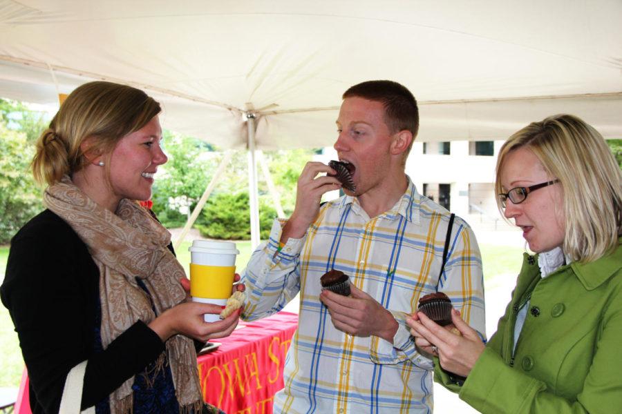 On Thursday, Sept. 22, Elyse Gieschen, Brian Vanderheyden and
Ashley Huth, all graduate students in education leadership and
policy studies, enjoy the cupcakes at the Cupcake Smackdown outside
of the Parks Library. Student Affairs leaders faced off to raise
the most money through donations for cupcakes. The money will go
the 2011 United Way campaign.  
