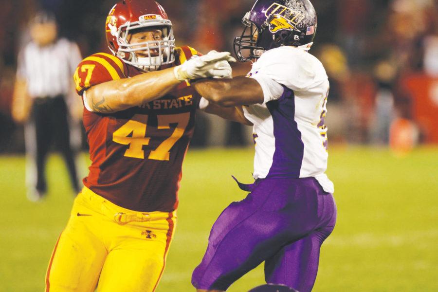Linebacker A.J. Klein pushes off the UNI opposition during the
game against Northern Iowa on Sept. 3. Klein had a total of three
tackles and three assissts during that game, helping the Cyclones
win with a final score of 20-19.
