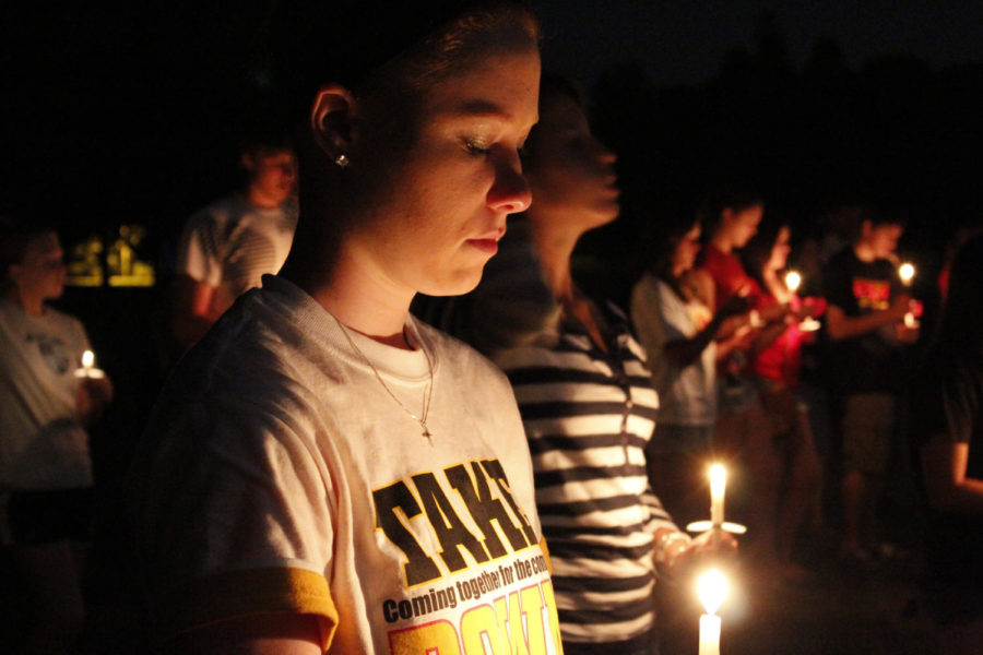 Students participate in a moment of silence and candlelight
vigil on Central Campus on Sunday evening. Participants of the
ceremony where there to acknowledge the terrorist attacks that
happened 10 years ago.
