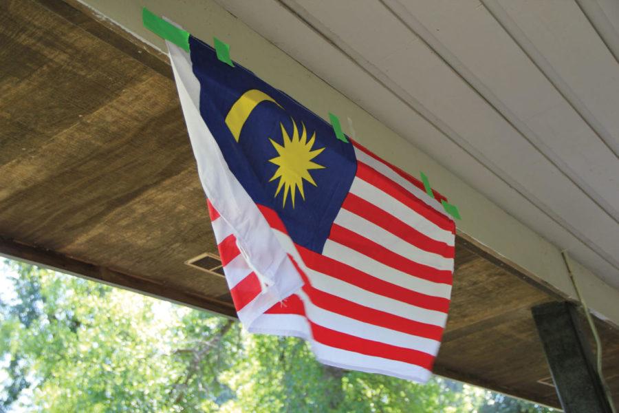 The Malaysian flag flies at the Association of Malaysian
Students at ISU gathering Monday, Sept. 5. This multicultural group
aims to foster a closer and better relationship between Malaysian
students and other members of the community.

