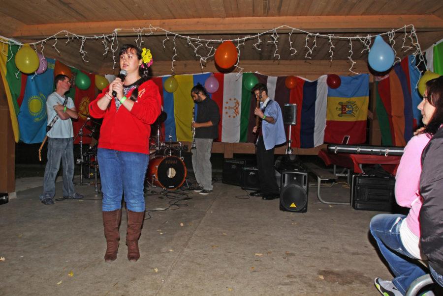 Anna Prisacari, graduate student and president of the Russian
Speaking Student Association, talks to guests at the RSSA fall
picnic on Saturday, Sept. 17, at Brookside Park. The next RSSA
event will be a tournament of the popular Russian card game "durak"
on Sept. 27 at Stomping Grounds.
