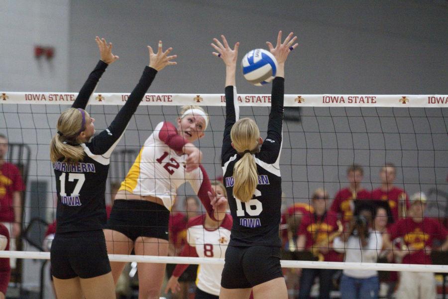 Middle blocker Debbie Stadick goes for a kill against Northern
Iowa during the ISU-UNI game on Wednesday night at Ames high
school. Stadick had a total of seven kills throughout the night and
Iowa State won with a final score of 3-0.
