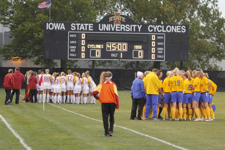 Iowa State and South Dakota State gather together for their
individual team cheers before the start of their match Friday
night, Sept. 16, 2011 at the ISU Soccer Complex. All home soccer
matches this season are free for the public.
