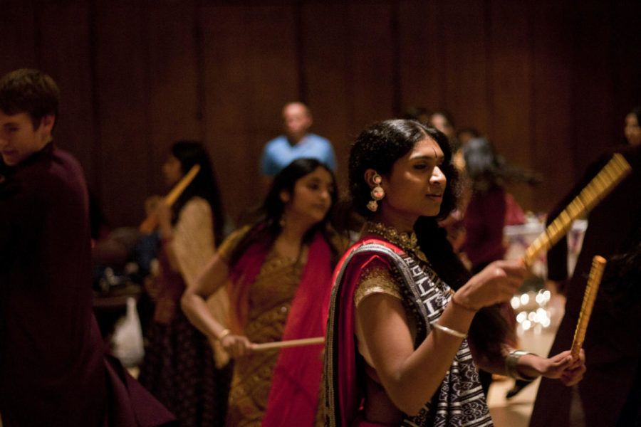 The Indian Students Association hosted Dandiya Night on Oct. 15,
to enjoy the traditional Indian Dandiya Raas, or stick folk dance.
Priya Ravindran, junior in chemical engineerng, spins and adds her
own flare to the basic steps of the dance as she moves from partner
to partner in the inner circle of the dance.
