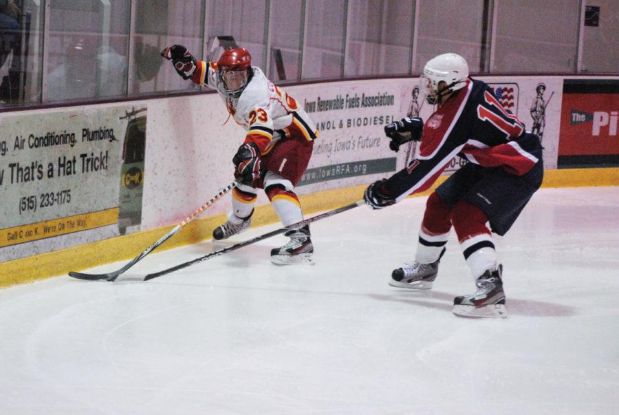 ISU forward Chris Cucullu reaches for the puck during the
Cyclones' game with Arizona on Friday, Oct. 21, at the Ames/ISU Ice
Arena. The Cyclones struggled on the power play, failing to convert
any of their four opportunities with a man advantage in the
loss.
