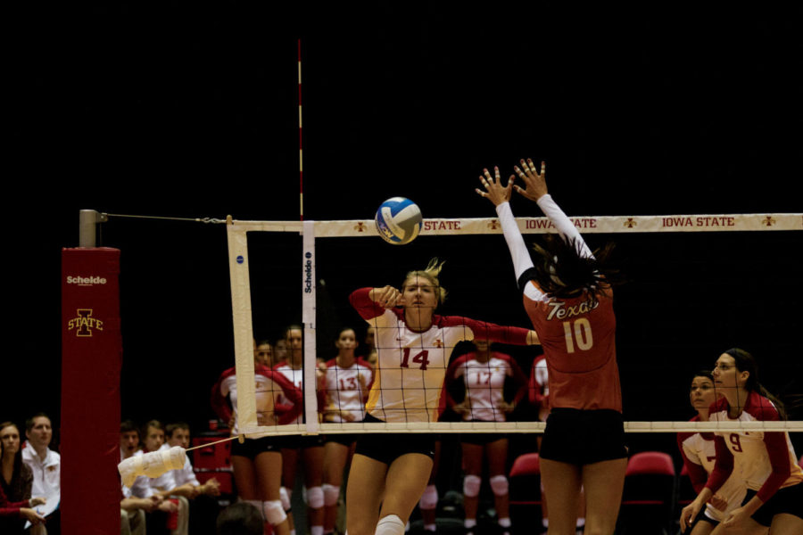 Jamie Straube scores a point in the second set against Texas on
Sunday, Oct. 2. The ISU womens volleyball team fell just short of
No. 8 Texas in five sets.
