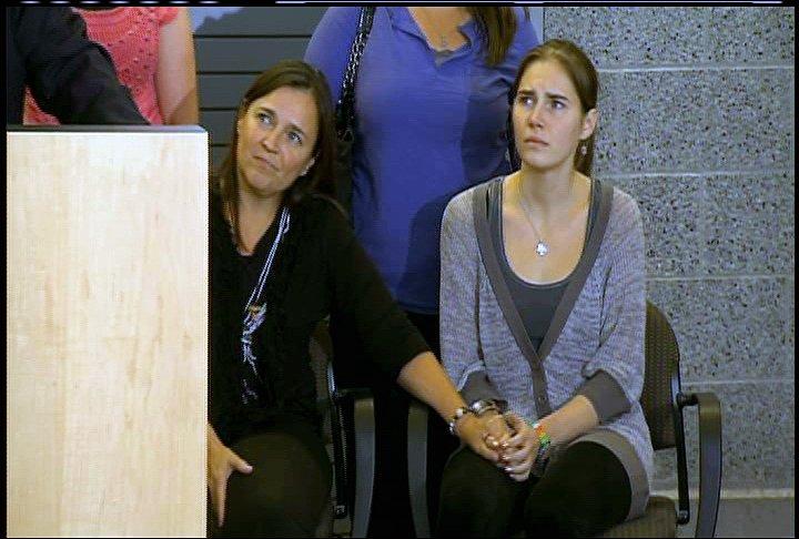 In brief remarks to the media just after returning to her
hometown of Seattle, an emotional Amanda Knox thanked those who
believed in her and supported her fight to overturn her murder
conviction in Italy, Oct. 4, 2011.
