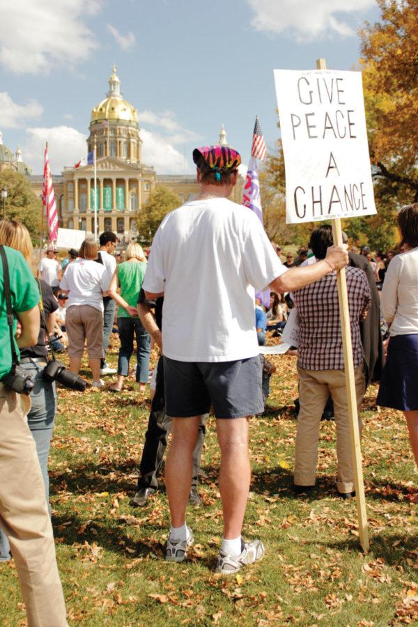Demonstrators gather for the Occupy Iowa kick-off rally, flanked
by the Iowa State Capitol in Des Moines on Sunday, Oct. 9th. The
event in Des Moines was one of many held across Iowa this week with
similar events held in Dubuque and Iowa City. 

