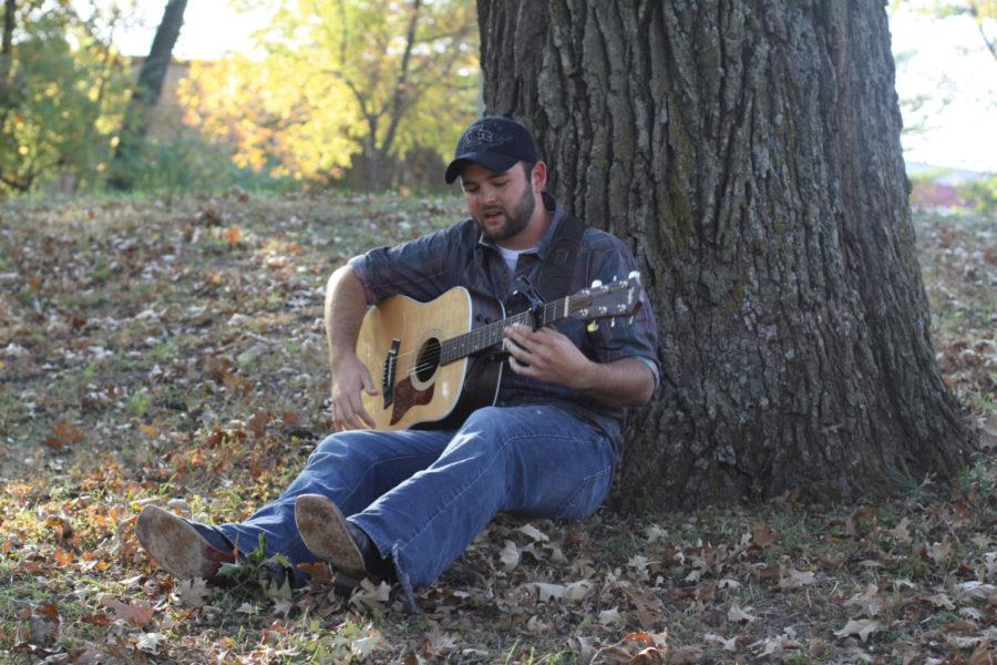 Neil Hewitt, senior in liberal studies, is a country singer from
Nevada, Iowa. Hewitt released his first single, The Request, when
he was 21 and will continue singing after graduating in
December.
