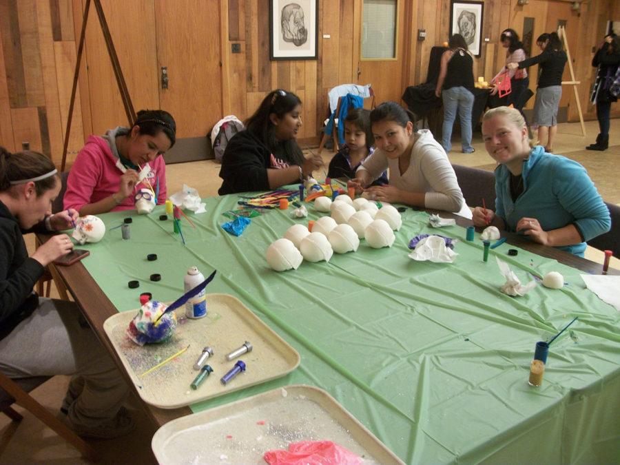 Before Thursdays Dia de los Muertos celebration,
Mexican-American Young Achievers Society members decorate sugar
skulls Oct. 20 in the Memorial Unions Pioneer Room. They called
this event Noche de Artesanias, which means Night of the Artisans
in English.
