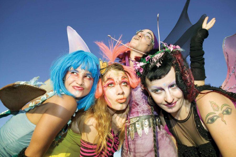 Women wearing fairy costumes posing together.  Stoffa offers
several pop culture themed costumes for Halloween 2011.
