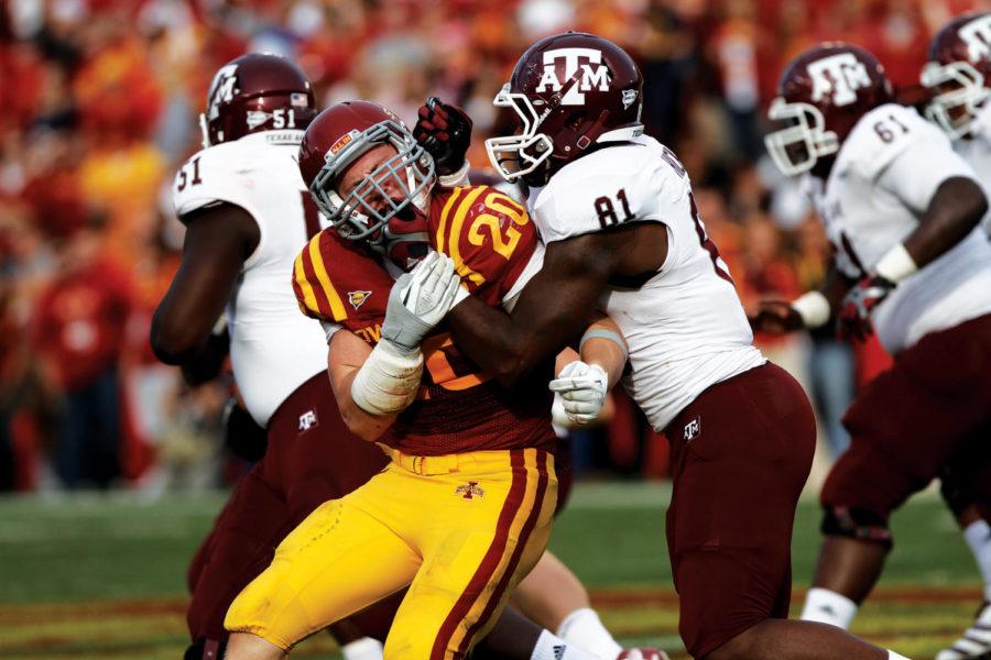 Linebacker Jake Knott gets a hard block from Texas A&M tight
end Nehemiah Hicks during the game against the Aggies on Saturday,
Oct. 22. Knott had three tackles in the game, and the Cyclones lost
to the Aggies 33-17.
