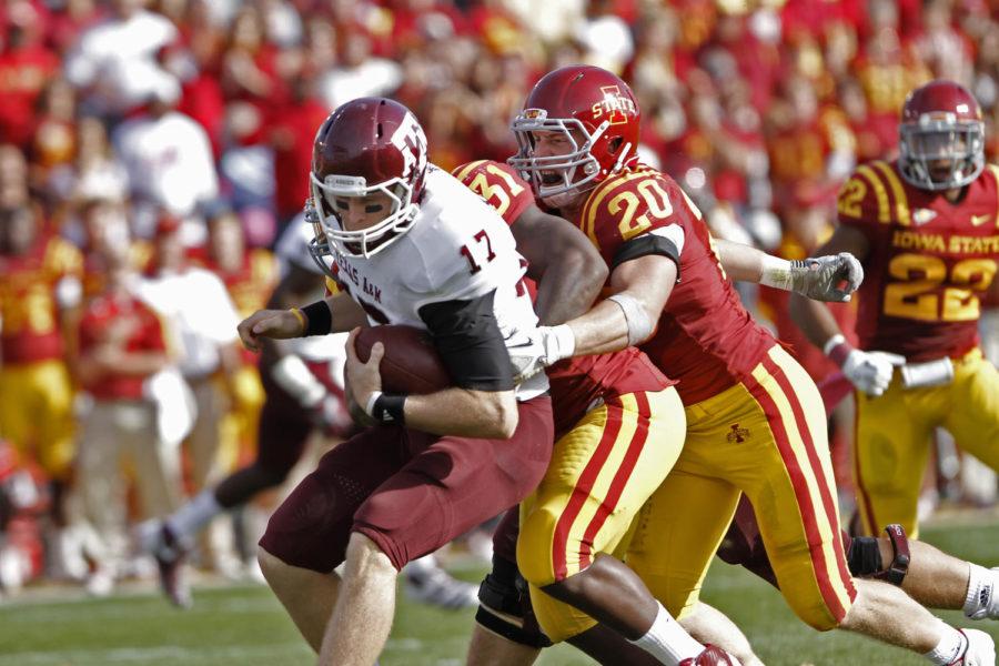Linebacker Jake Knott, along with defensive end Rony Nelson,
take down Texas A&M quarterback Ryan Tannehill. Knott had a
total of three tackles in the game, and the Cyclones fell to the
Aggies 33-17.
