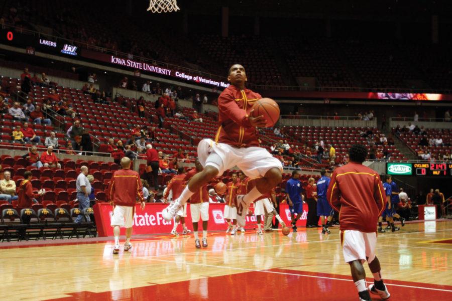 Players warm up for their first exhibition game of the year
against Grand Valley State on Sunday, Nov. 6, at Hilton
Coliseum.
