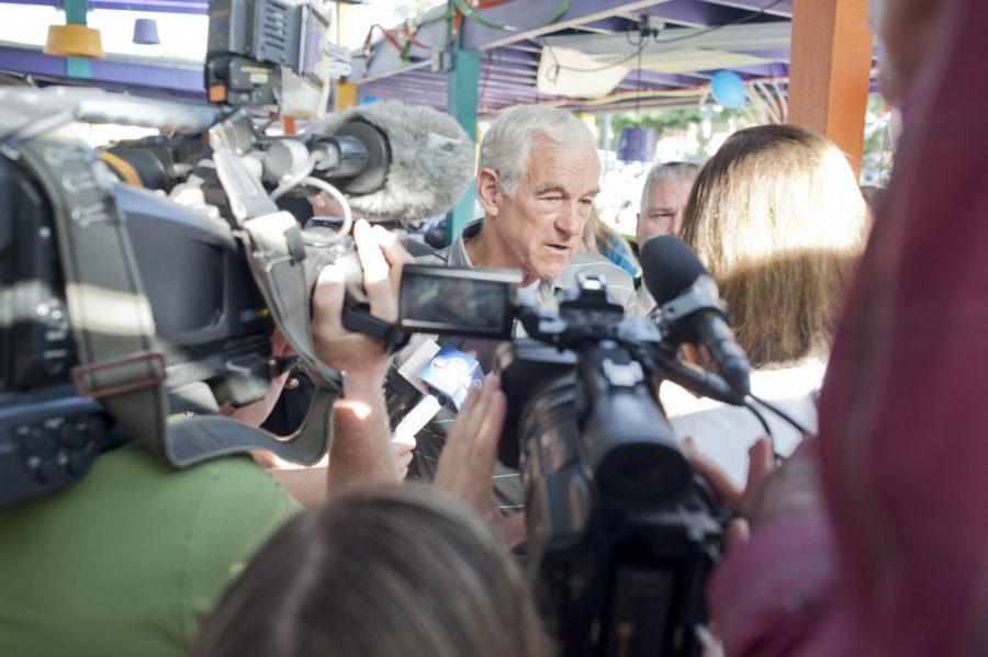 Ron Paul, a candidate for the 2012 Republican Party presidential
nomination, gives interviews before he talks about his presidential
ambition at the Polk County Picnic. The Polk County Picnic is hold
in Jalapeno Petes at the Iowa State Fairgrounds on Aug. 27,
2011.
