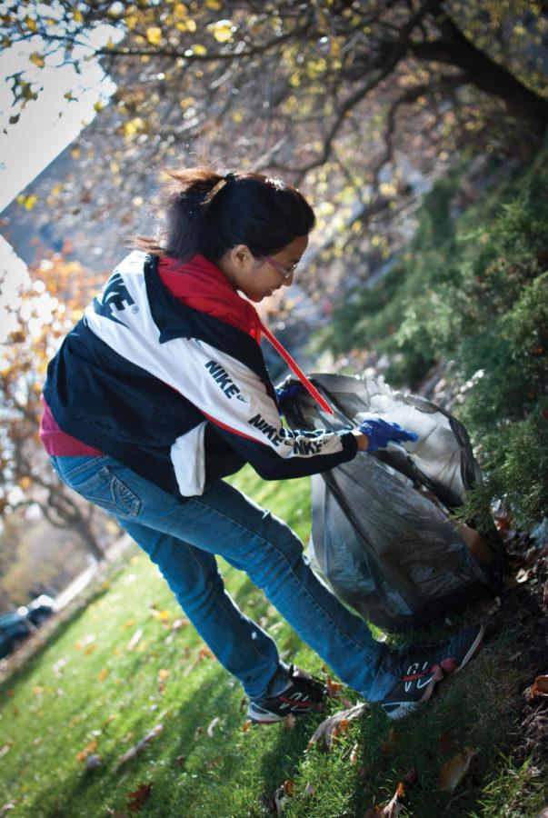
Kanchana Perera, senior in chemical engineering, picks up a
piece of trash outside Beardshear hall on Sunday, Nov. 6.
Volunteers scattered across campus to help out with the Campus
Cleanup event put on by the International Student Council.

