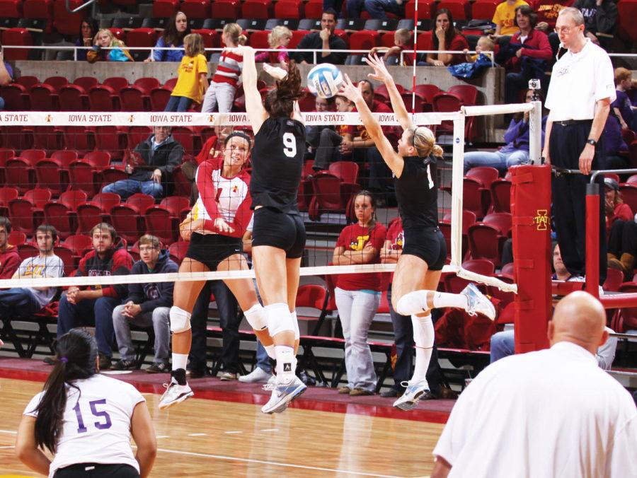 Outside hitter Carly Jenson attempts another spike on Wednesday,
Nov. 16 at Hilton Coliseum. Jenson had a career-high of 16 kills
out of 27 attempts.
