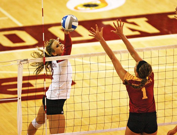 Outside hitter Carl Jenson attempts to block a hit from Oklahoma
outside hitter Suzy Boulavski during the game on Wednesday, Nov. 2
in Norman, Okla. Iowa State took down Oklahoma 3-1. 
