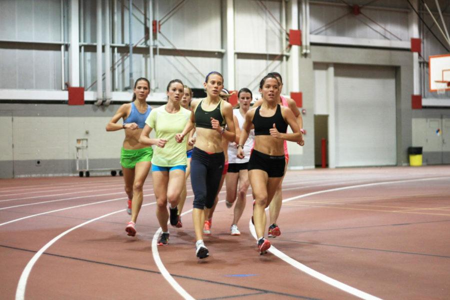 The womens cross-country team runs laps during an indoor
practice at Lied Recreation Athletic Center on Tuesday, Nov. 8. The
Cyclones won their first-ever Big 12 title Oct. 29 at the Pebble
Creek Country Club in College Station, Texas.
