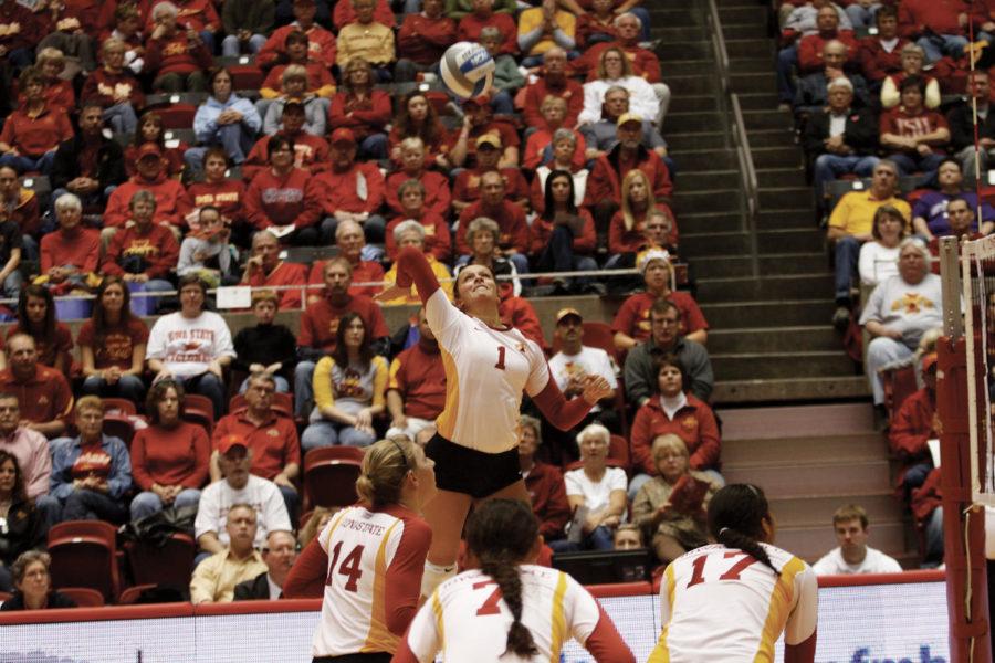 Outside hitter Carly Jenson spikes the ball back to Texas Tech
during the game on Saturday, Nov. 5. Jenson lead the team in
scoring with 14 kills and 15 points throughout the match.
