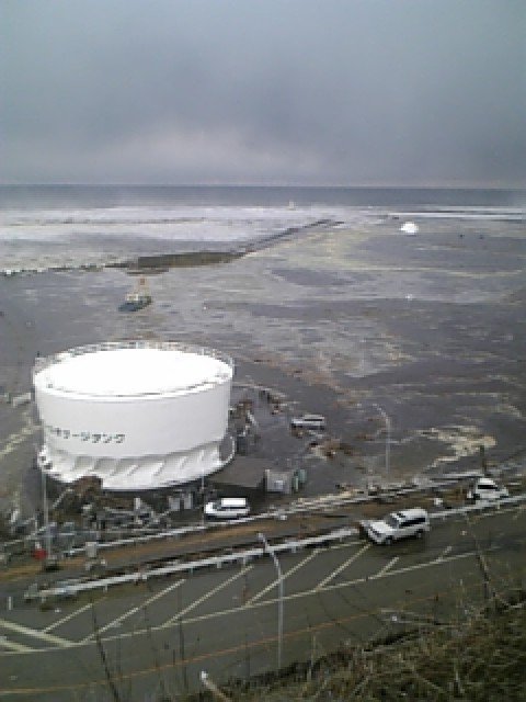 Pictures of the Tsunami as it hits the Fukushima Daiichi Nuclear
Power Station. This shows the slope at the eastern side of
Radioactive Solid Waste Storage Facility.
