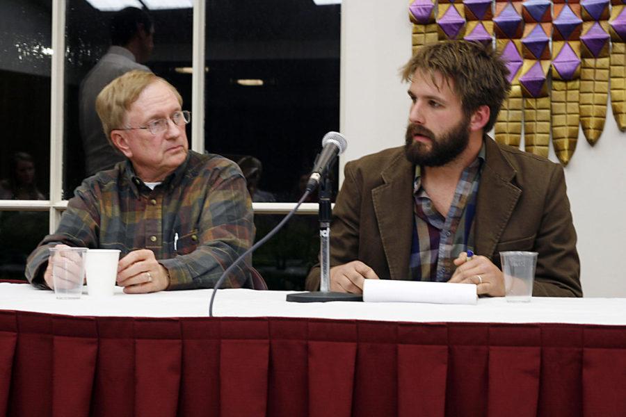 Hank Taber, ISU professor emeritus in horticulture and local
farmer, and Chris Corbin, ISU graduate and local farmer, discuss
the benefits of being small-scale producers on Tuesday, Nov. 8,
during the Farm to Fork panel discussion. The panel was hosted by
ISU Dining Services to examine the food system from local producers
to consumers in Ames via retail and ISU Dining locations.

