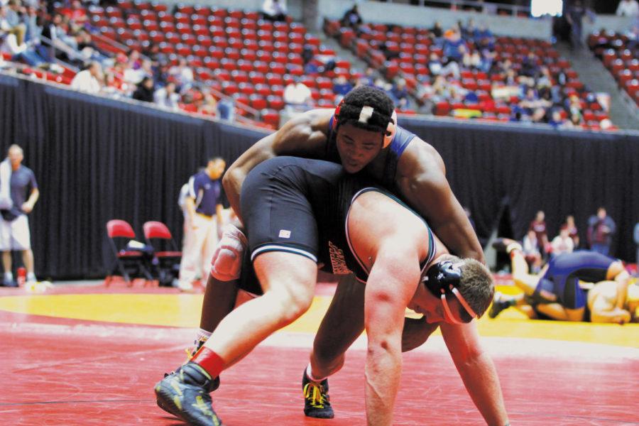 Matt Gibson, unattached, wrestles with James Malechek from
Wisconsin-Parkside during the Harold Nichols Cyclone Open held
Sunday, Nov. 13, at Hilton Coliseum. Gibson defeated Malechek 10-1
in 11 minutes.
