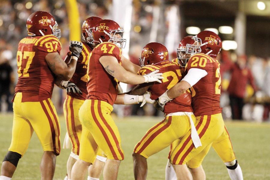 The ISU football team celebrates during the game against
Oklahoma State Friday, Nov. 18. The Cyclones beat No. 2 Oklahoma
State Cowboys 37-31 Friday night. The victory was the first win for
the Cyclones against a team ranked No. 6 or higher.  
