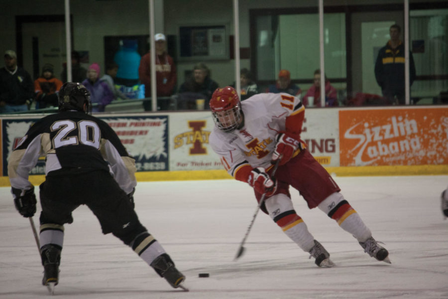 Freshman forward J.P. Kascsak dribbles around the Lindenwood
defender. The Cyclones fell to Lindenwood 4-3 on Friday, Dec. 2, in
sudden death after the Cyclones tied the game up in the final
seconds of the third period. 
