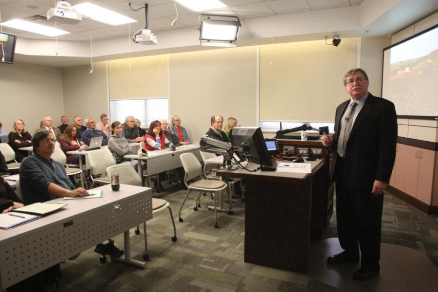 Mark Rasmussen gives a presentation on Monday, Dec. 5, at
Curtiss Hall. Rasmussen is a candidate for the directors position
of the Leopold Center for Sustainable Agriculture at Iowa State
University.
