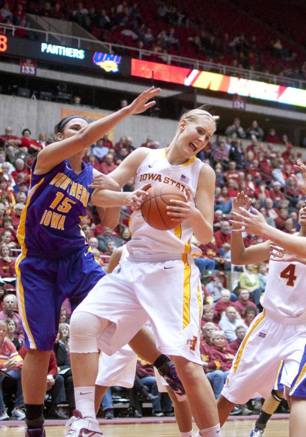 Center Anna Prins avoids a block from her opponent during Iowa
States game against Northern Iowa on Tuesday, Dec. 20, at Hilton
Coliseum. The Cyclones won 84-57.
