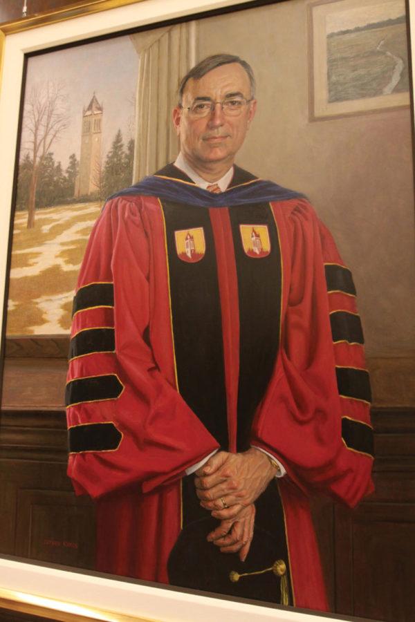 A portrait of President Gregory Geoffroy hangs during his
farewell reception Thursday, Dec. 8, in the Sun Room of the
Memorial Union. Geoffroy is stepping down as ISU president in
January.
