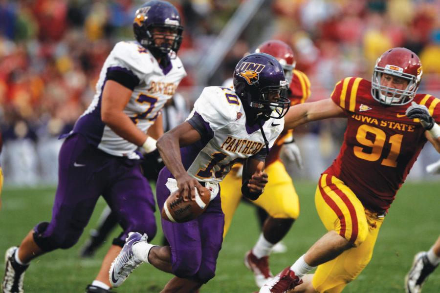 Defensive end Patrick Neal goes after UNI quarterback Tirell
Rennie during Saturday’s game. Iowa State defeated the Panthers
20-19.
