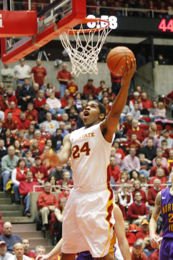 Center Percy Gibson puts up a layup during the second half of
the ISU-UNI game Wednesday, Nov. 30, at Hilton Coliseum. Gibson put
up a total of four points, but the Cyclones fell to the Panthers
69-62.
