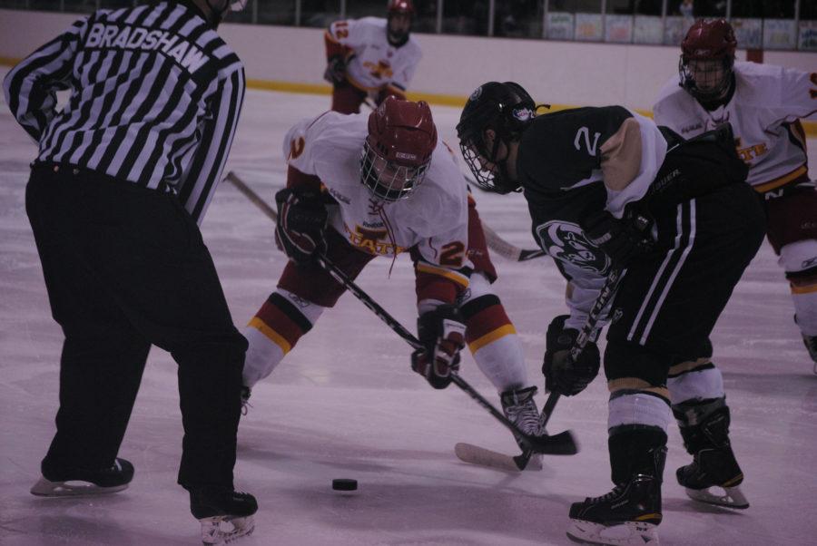 Former ISU forward Marcus Andary faces off with CSU forward Ben
Smoot during the ISU-Colorado State hockey game Jan. 28. Andary was
killed Sunday night in an auto accident.
