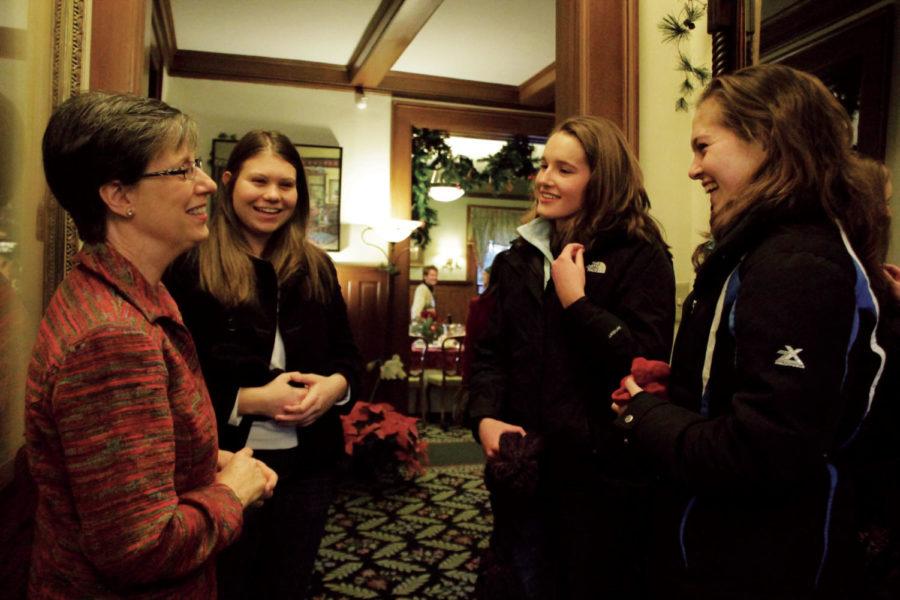 Kathy Geoffroy welcomes Sydney McBride, Katie Berlund and Erin
Jackson, all freshmen in meteorology, to the Knoll for hot
chocolate, cookies,= and tours to kick off WinterFest on Friday,
Dec. 2. The open house featured Ellen Parks' original hot chocolate
recipe, which has since become known as "Knoll Hot Chocolate." 
