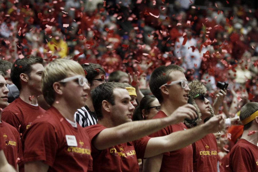 Cyclones Alley begins the Iowa State-Missouri game by throwing
red paper in the air Wednesday night at Hilton Coliseum. The Tigers
defeated the Cyclones 76-69. 
