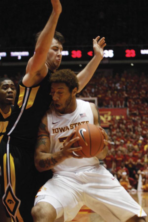Royce White battles in the paint, adding to Iowa States lead in
the second half on Friday, Dec. 9, at Hilton Coliseum. It was
Whites eighth double-digit game of the season.
