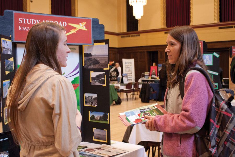 Brooke Pascarella, right, junior in accounting, hears about
study abroad in Ireland. Study Abroad Fair is held on Thursday,
Jan. 26, at the Great Hall of the Memorial Union.

