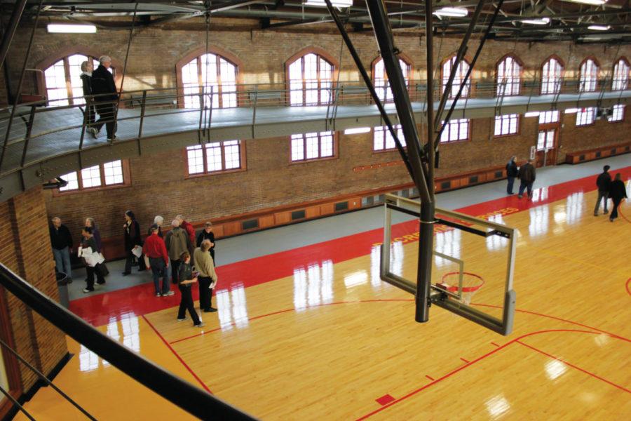 Visitors explore the newly rennovated State Gym during an open
house on Sunday, Jan. 8. The orientation of the basketball courts
within the older portion of State Gym was changed in order to fit
two full-length basketball courts. Including the newest addition,
State Gym now sports five full basketball courts. 

